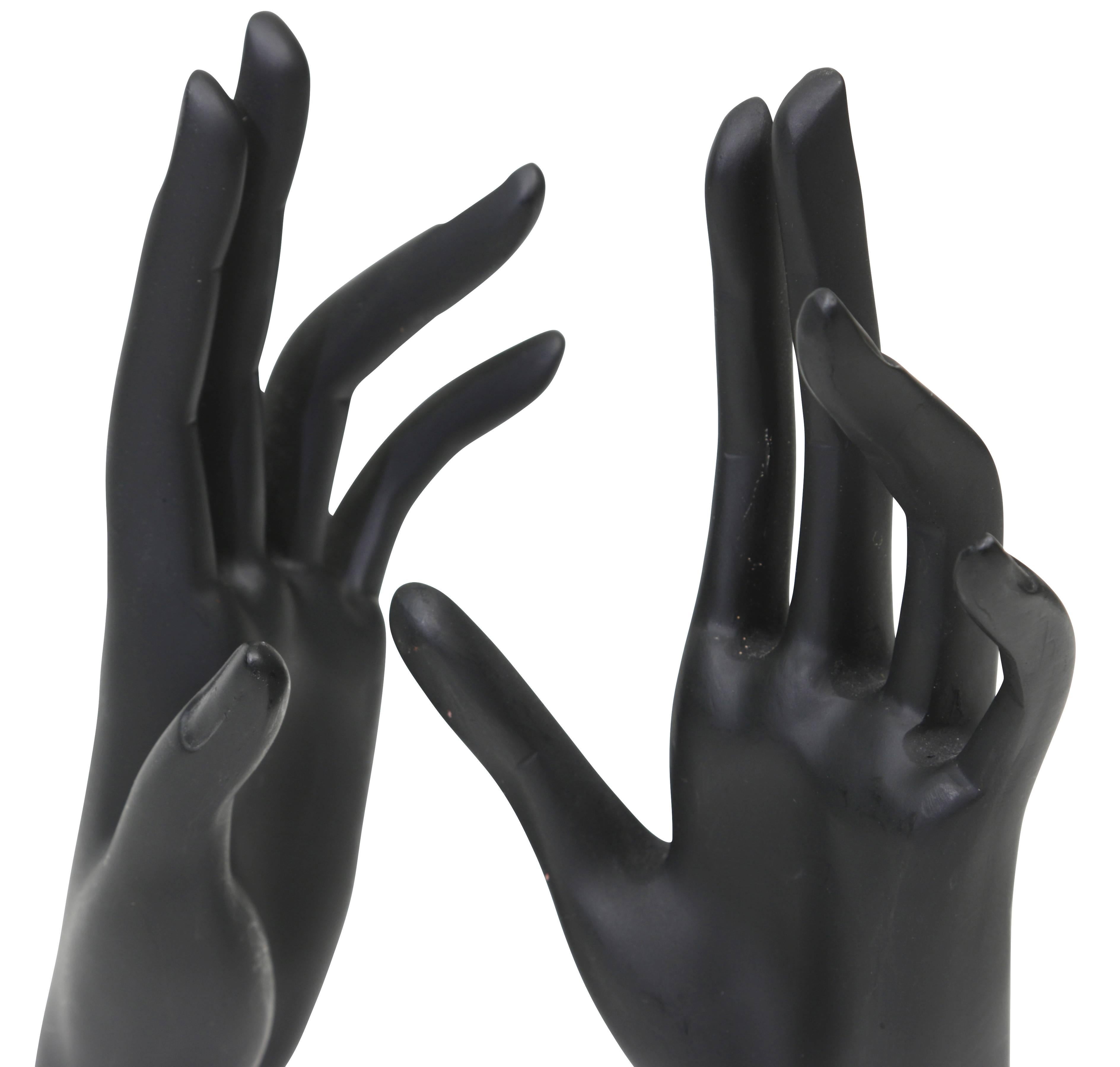 Great pair of black painted cast resin mannequin hands with elongated fingers.
