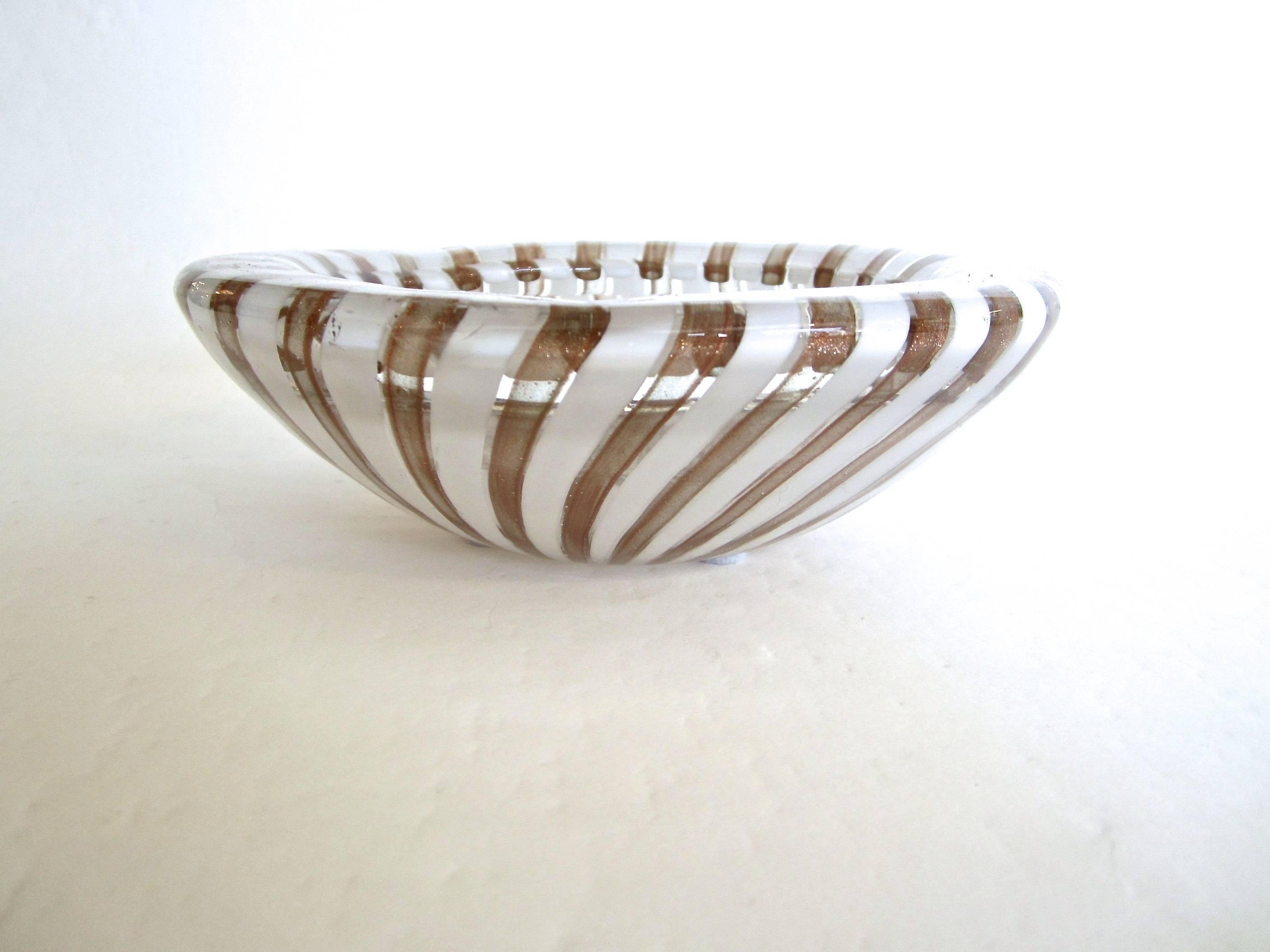 Beautiful handblown Murano glass bowl with infused copper flecking next to white stripe swirls. Bowl has thick structured rim. Great as display and also for utilitarian use.