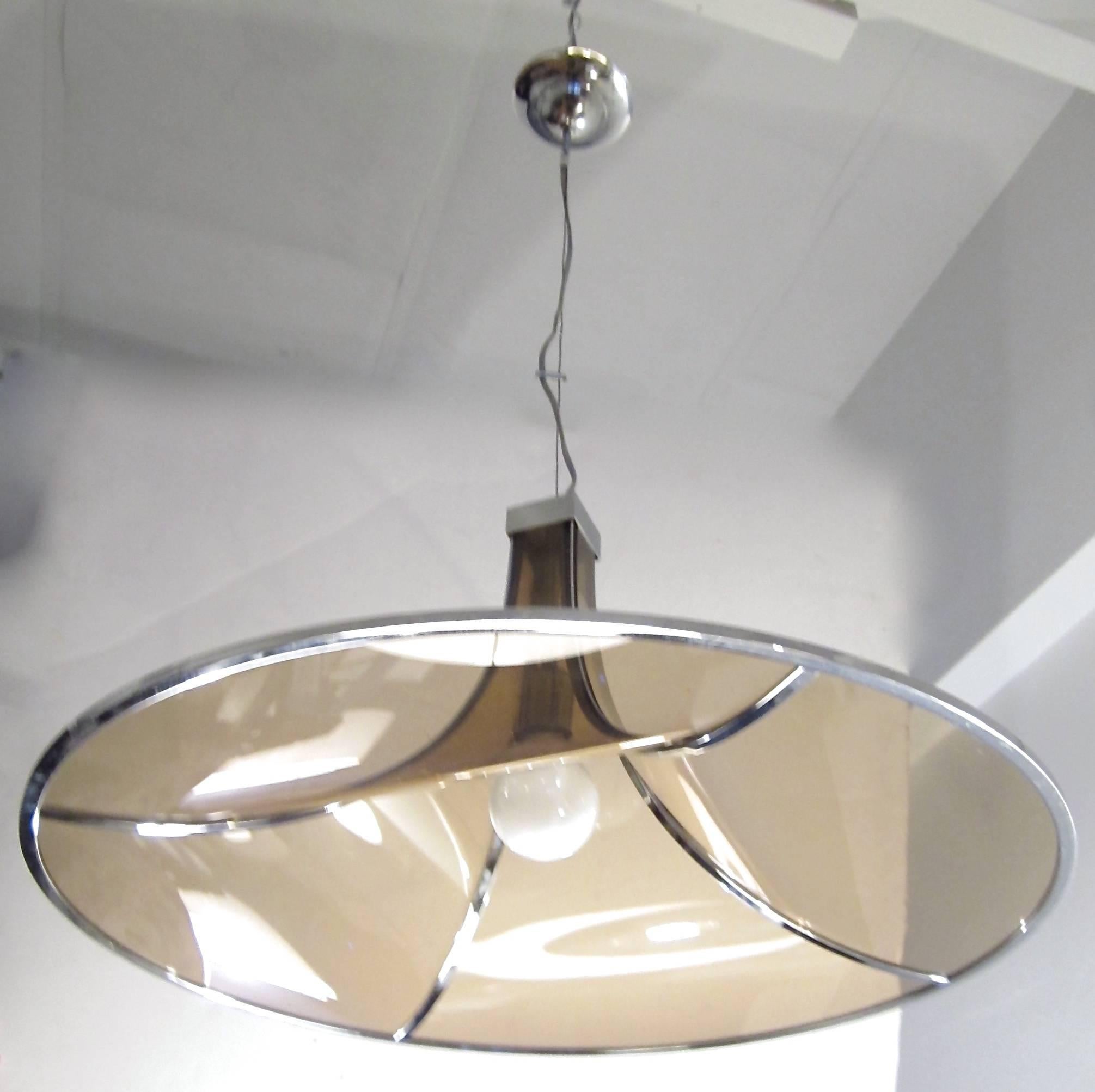 Italian amber glass and chrome hanging pendant with cable up to chrome canopy. Rewired to US Standards. Takes one standard base lightbulb up to 150W.