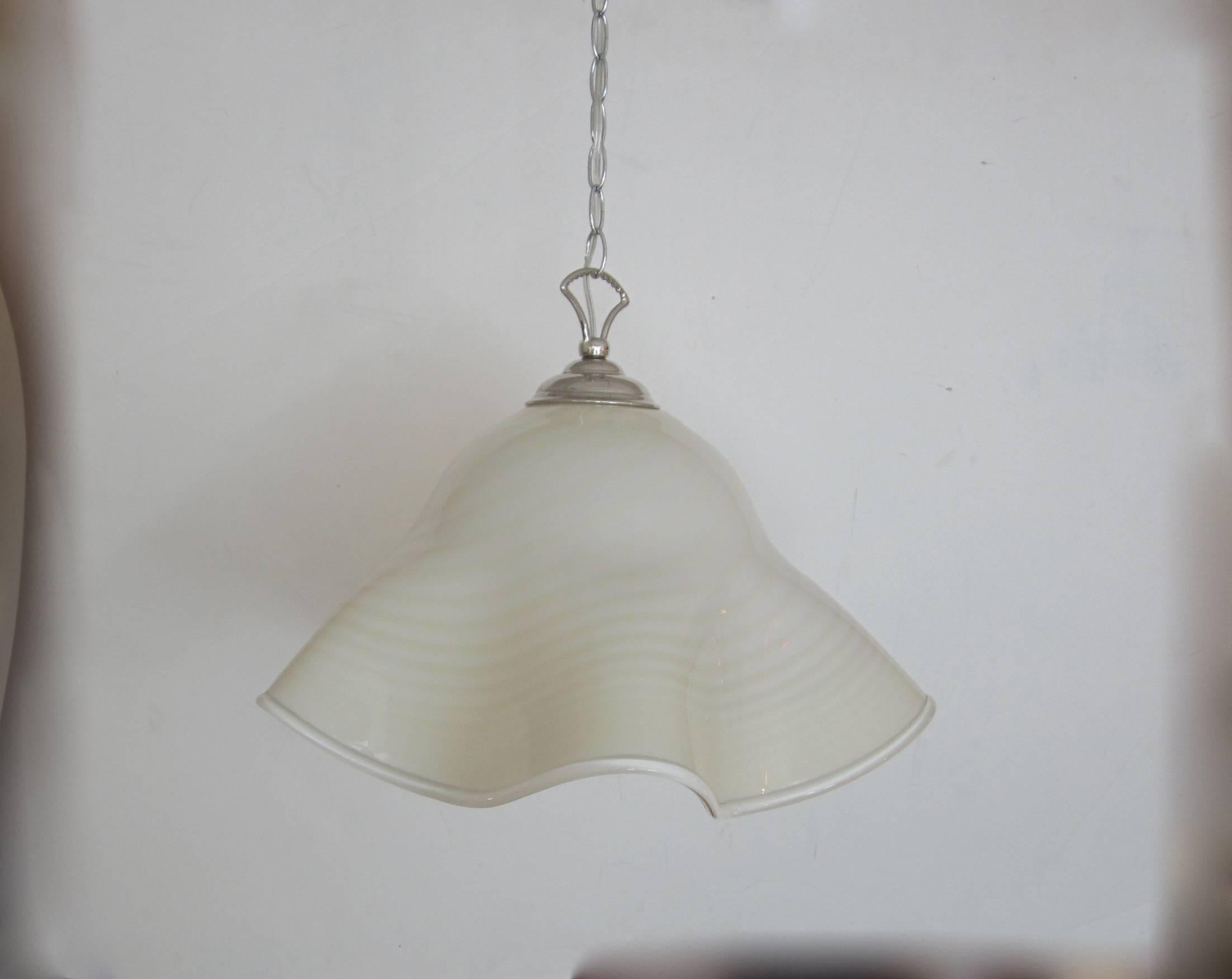 Beautiful vintage handblown Murano glass hanging pendant light fixture in a tan color with stripes and scalloped edges. Rewired to US Standards and appointed with nickel fittings including the cap and hanging hoop.