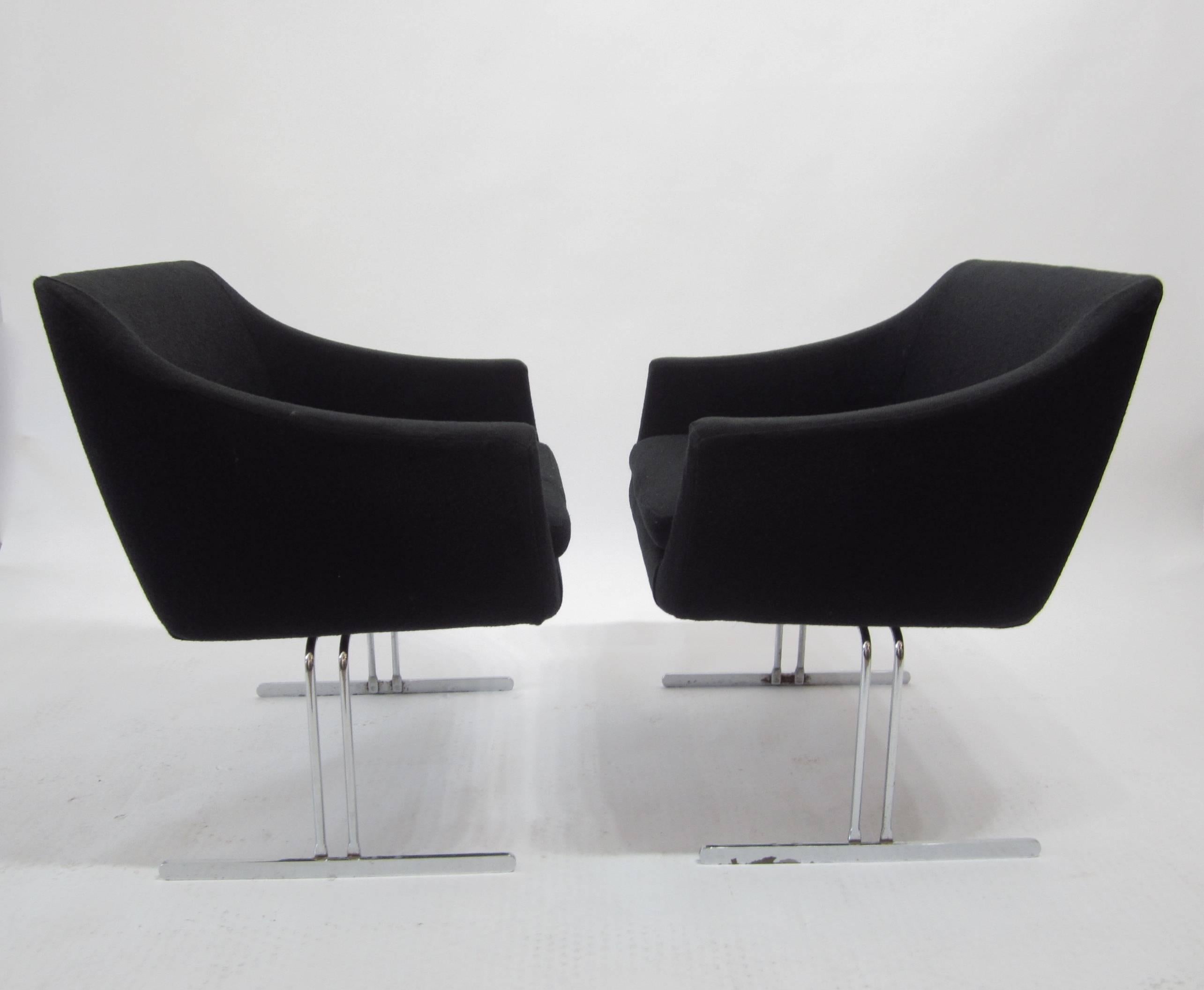 Fantastic pair of lounge chairs by Hugh Acton for Vecta Group, Italy 1. Comfortable and easy to place for conversational seating, theses chairs are in their original condition with shampooed upholstery and lightly polished frames which show wear to