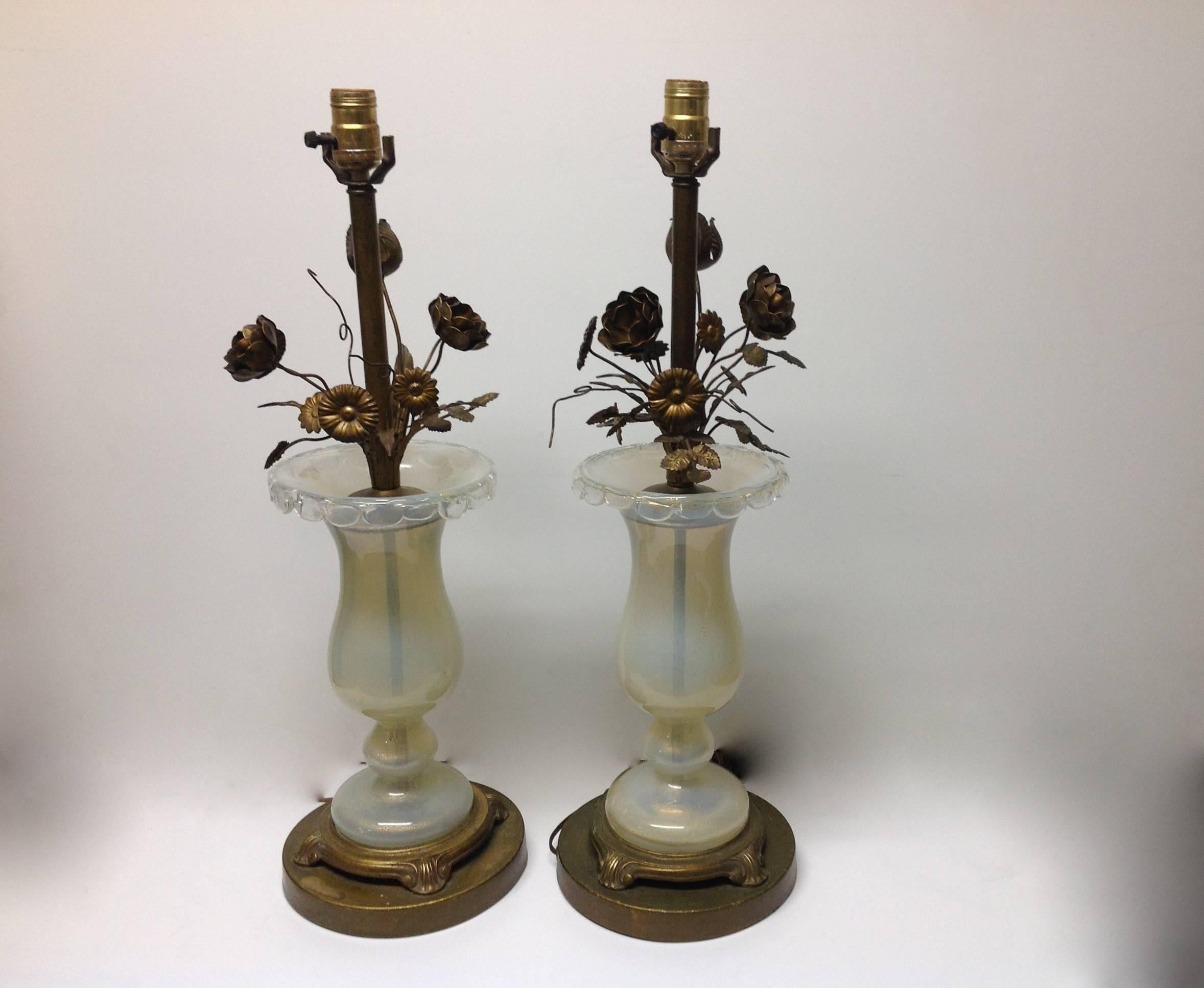 Beautiful pair of handblown Murano glass lamps filled with aventurine. The tops of the glass portions have a draped and scalloped design all completely hand done. The flowers are brass as are the tiered bases. Original Made in Italy foil stickers