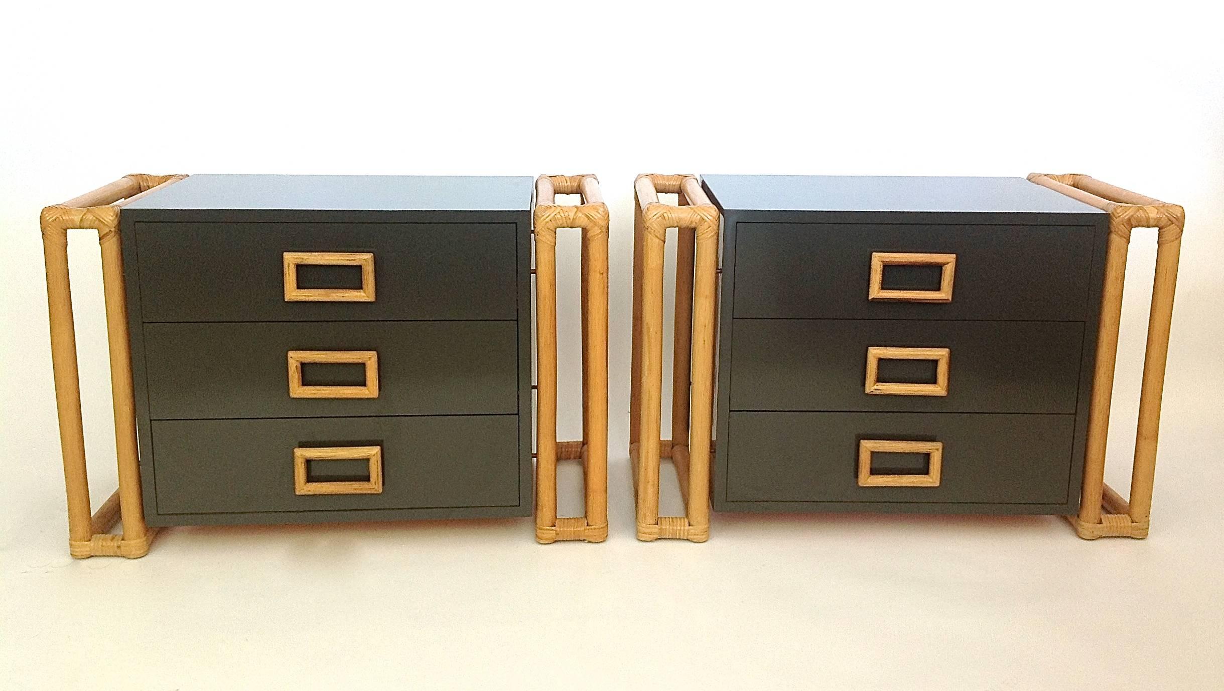 Wonderful pair of grey laminate side tables or chests each with three-drawers with large rattan pulls. The rattan sides add much depth and beauty and the drawers are on gliders. Great for bedside or anywhere a standout piece is needed. 