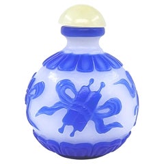 Chinese Blue Glass Overlay Globular Snuff Bottle Carved Buddhist Treasures 20c