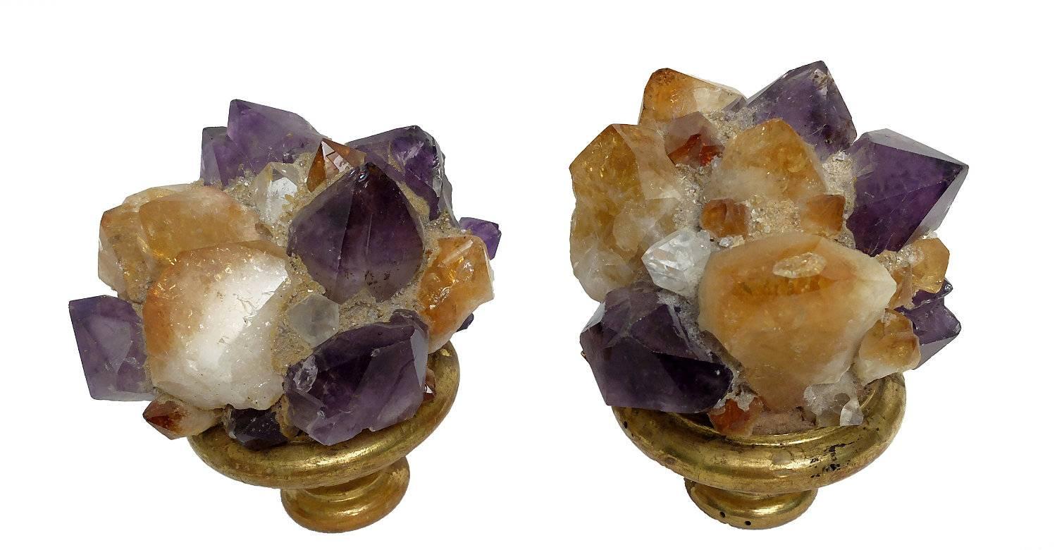 A Naturalia mineral specimen a pair of citrine quartz and amethyst crystals druzes, mounted over gold-plated wooden bases, in the shape of a vases.