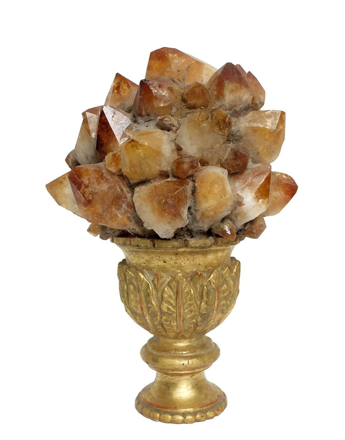 A Naturalia mineral specimen a pair of citrine crystals druzes, mounted over gold-plated wooden bases, in the shape of a vases.