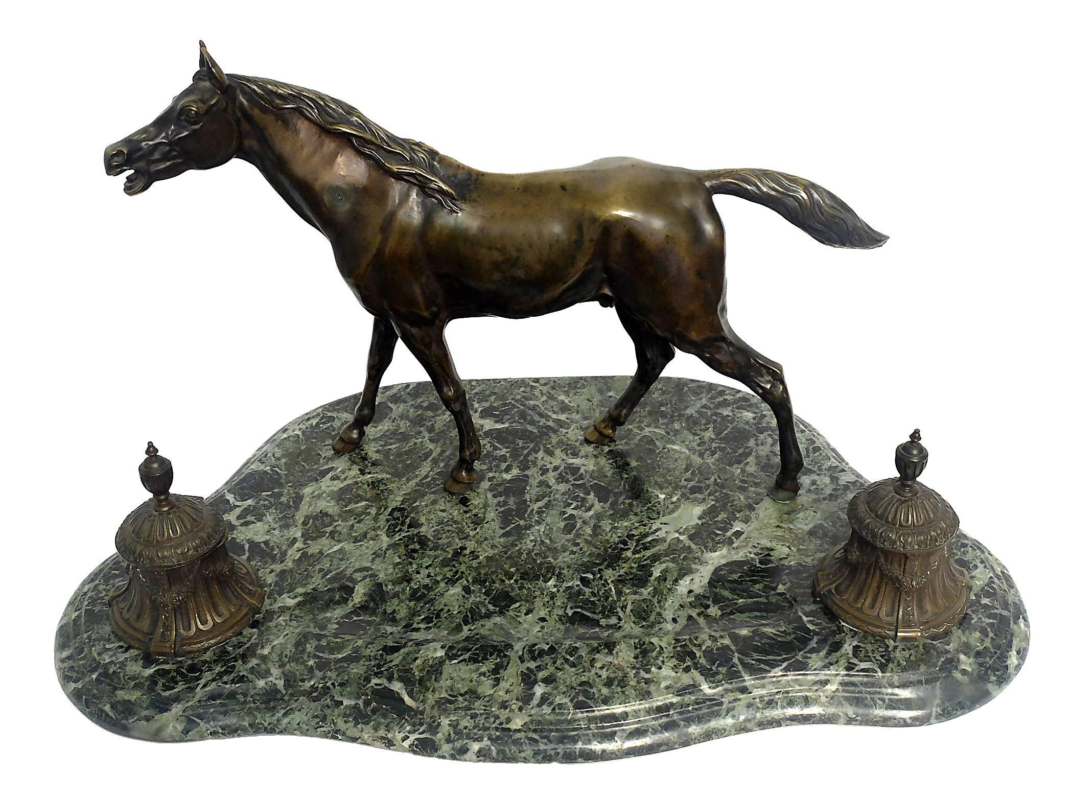 English bronze and marble inkwell, the base is made out of green veined marble, over which is a bronze of riding horse and two ink reservoir. Missing glasses, England, circa 1880.