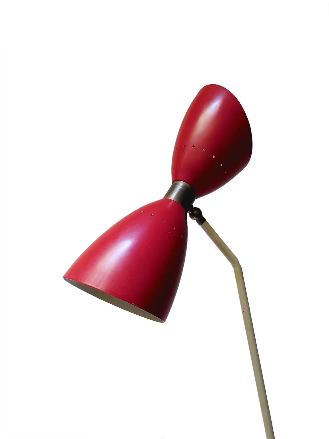 Aluminum An Italian enameled aluminium and gilded brass floor lamp.