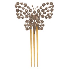 Turtleshell hair comb with butterfly in cutnsteel, France 1900.