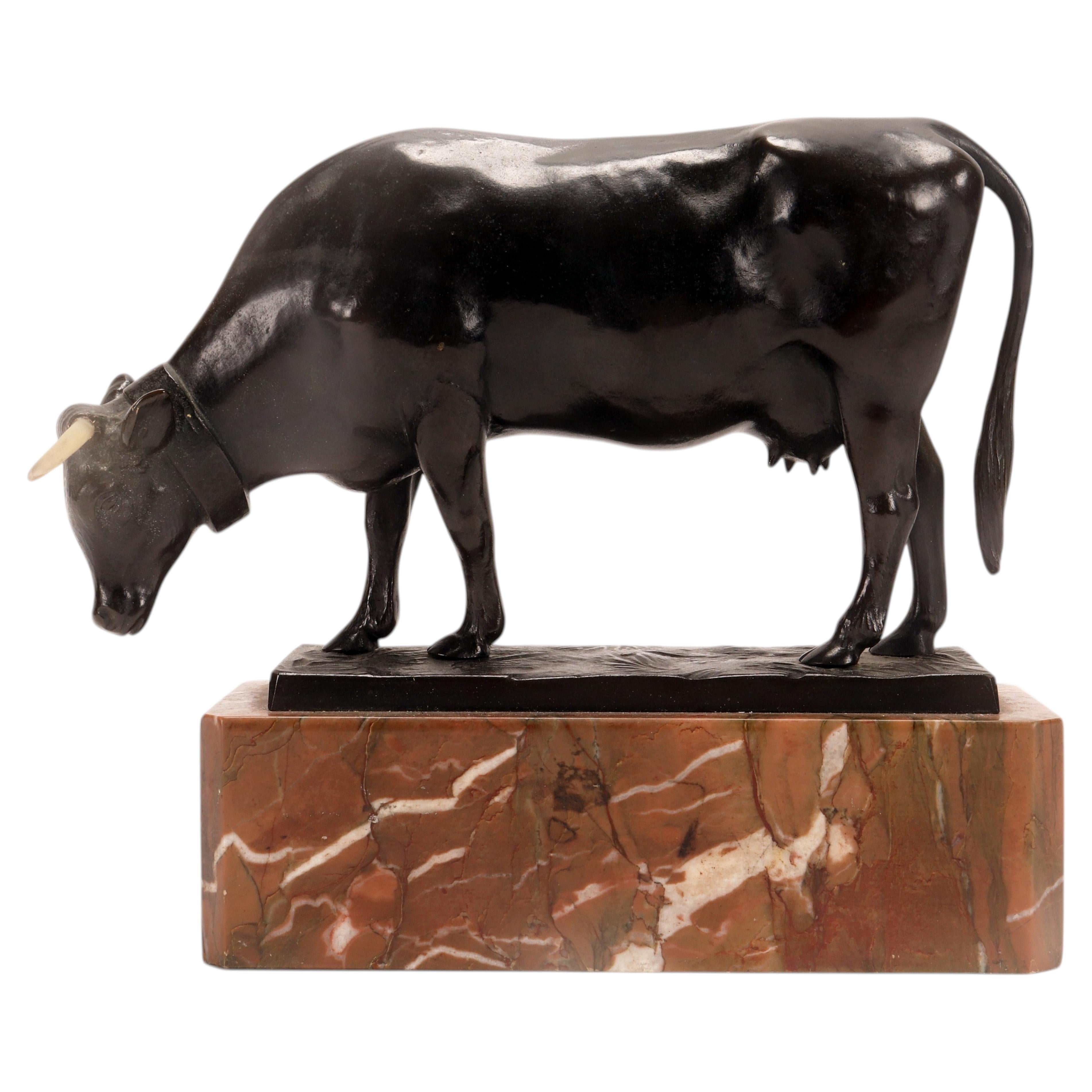 A bronze cow sculpture signed Moseriz, France 1880.