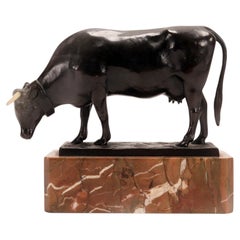 A bronze cow sculpture signed Moseriz, France 1880.