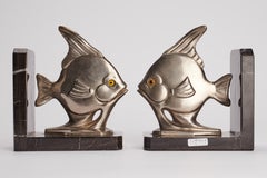 Art Déco white metal bookends depicting a fishes, France 1930.