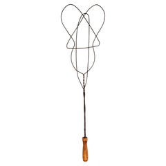 Antique carpet beater, guitar-shape, United Kingdom, late 1800s.