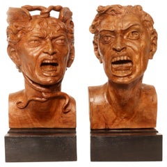 Two sculptures depicting the head of Medusa and the head of a man, Italy 1900.