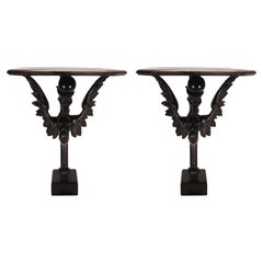 Pair of console tables with griffons in ebonized walnut wood, Italy 1860.