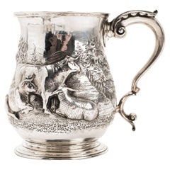 Sterling silver mug, Henry Holland London depicting grazing cows, 1856.