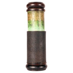 A small telescope in paper, glass and snakewood. Golden decoration. France 1780.