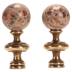 A pair of brecciated marble Paradise spheres, Italy end of 19th century.