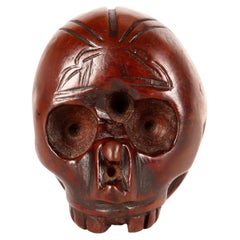Vanitas in carved and engraved boxwood, in the shape of a skull, Italy 1700.