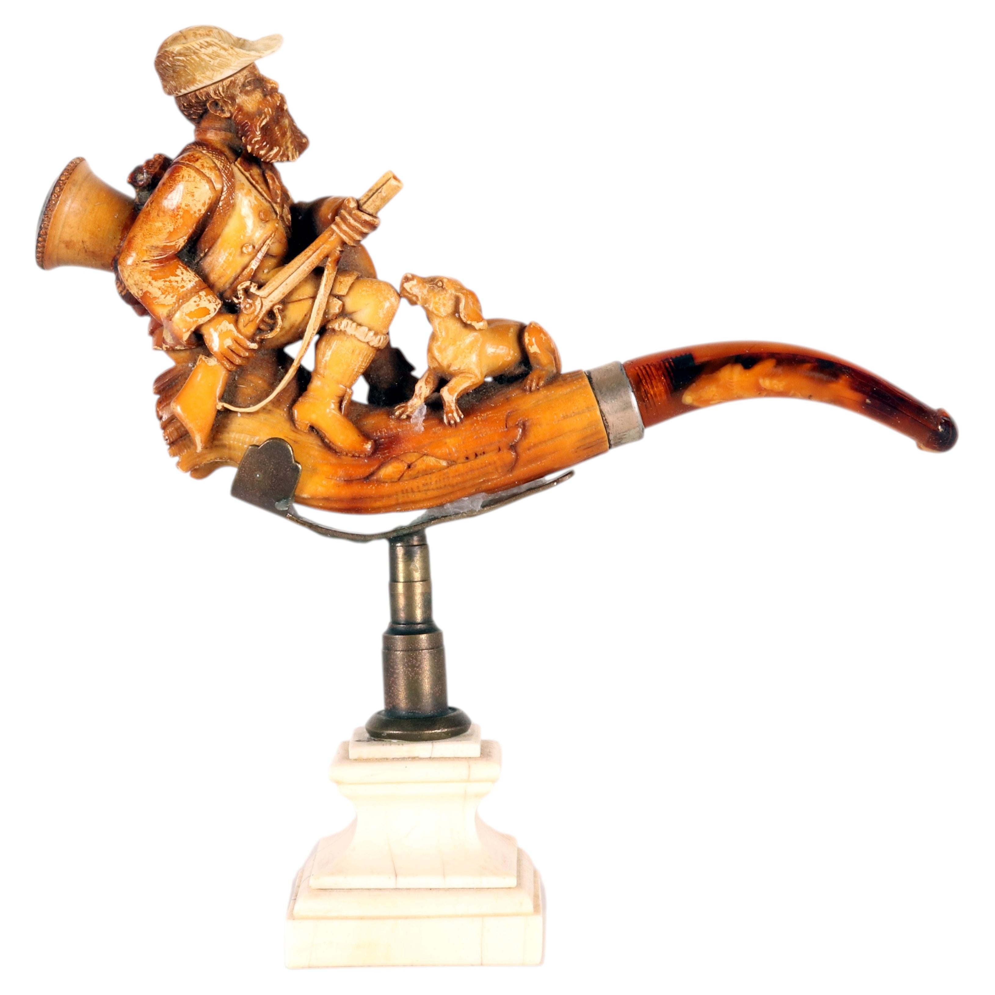 Amber meerschaum pipe, depicting a hunter. Vienna, Austria 1890.