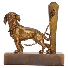 Gilded bronze sculpture depicting a hunting dog chained, France 1890.