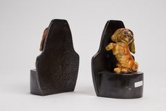 A pair of bookends with two sculpture of pekingese dogs, France 1915.