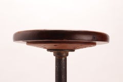 Black Tubular Iron & Solid Oak Bar Stool. USA, circa 1910.