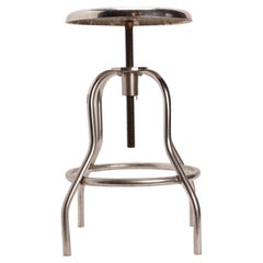 Height-adjustable chromed tubular metal stool, United States 1930.
