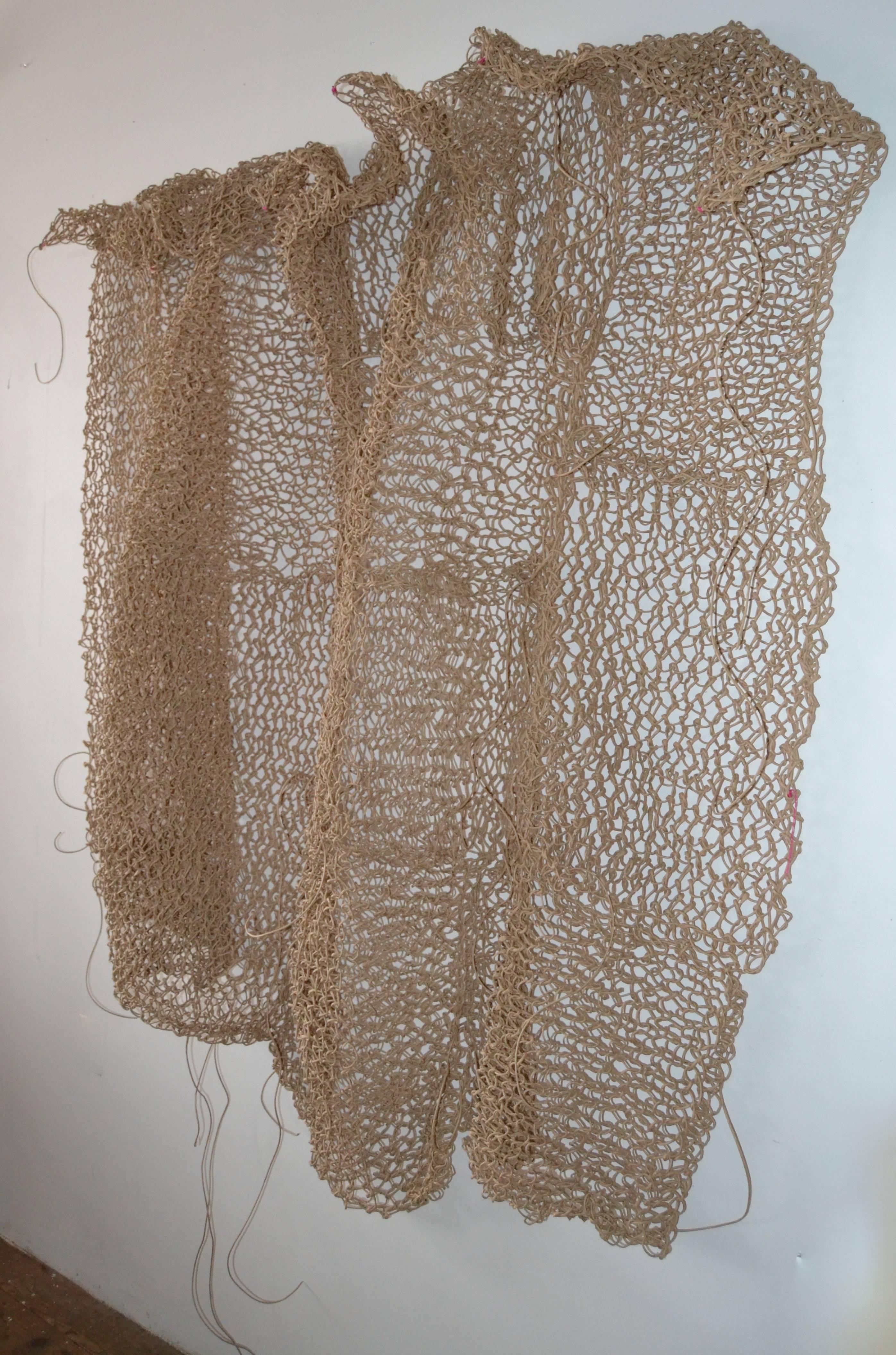 Large-scale knitted spun paper installation by the contemporary artist John Krynick. Wall sculpture evokes the nautical themes and interests of the artist. Dimensions variable. Includes installation instructions, artist or his assistant may be