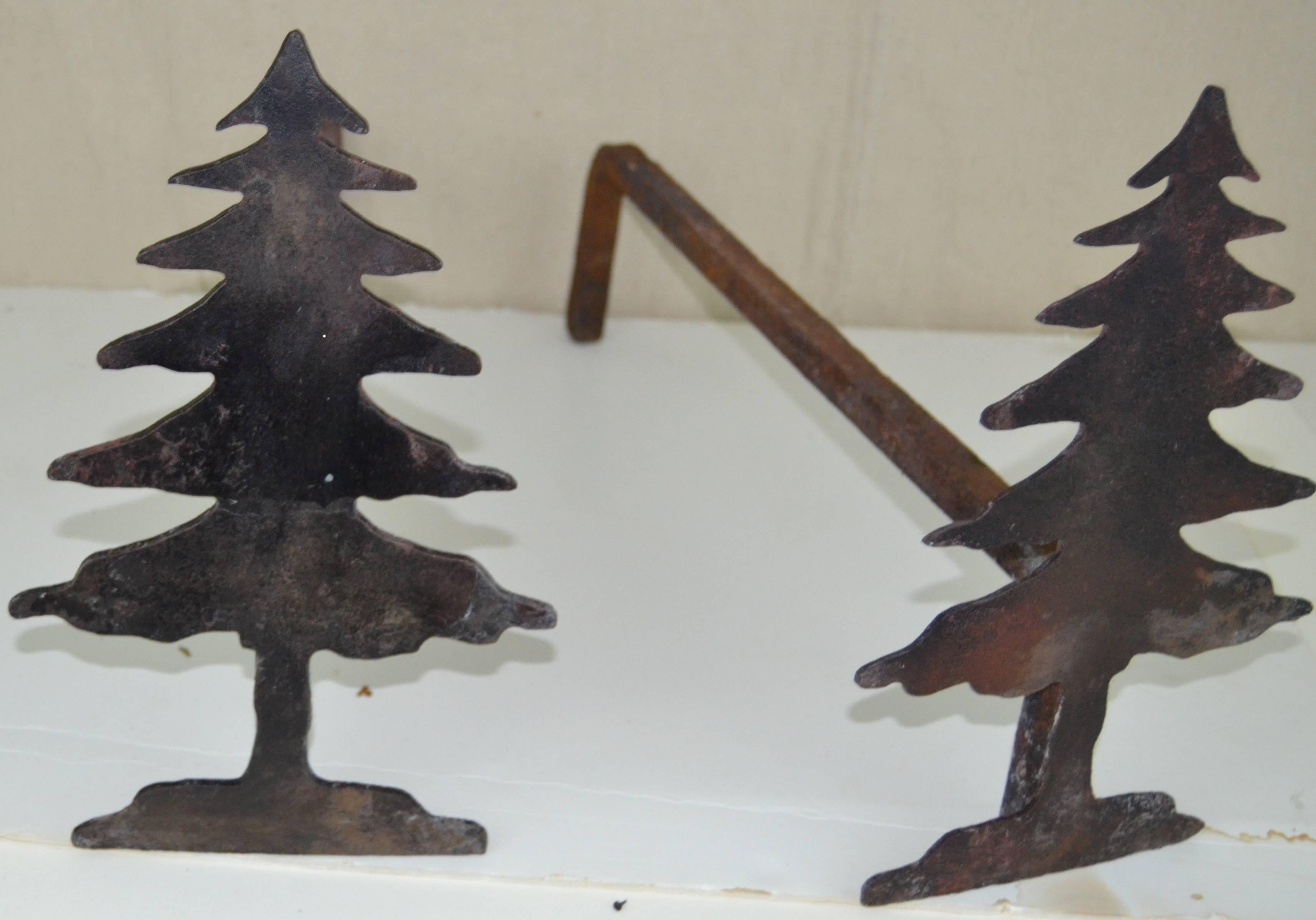 Fun and whimsical pair of pine tree andirons, small size with worn used surface.
