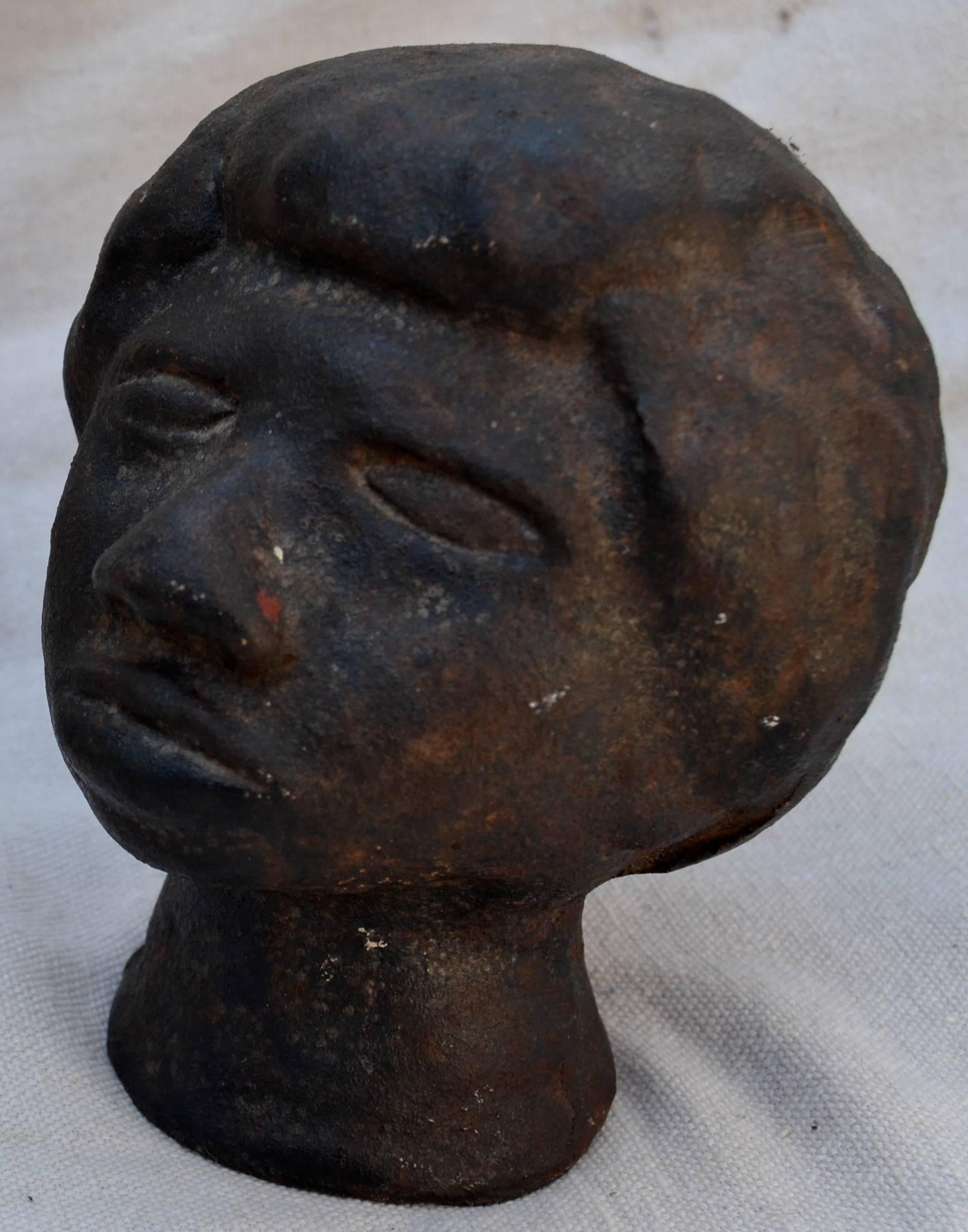 Rare 19th century cast iron portrait bust deftly rendered in the round. An unusual vernacular use of cast iron. Measures: Weight 12 lbs. excellent untouched surface.