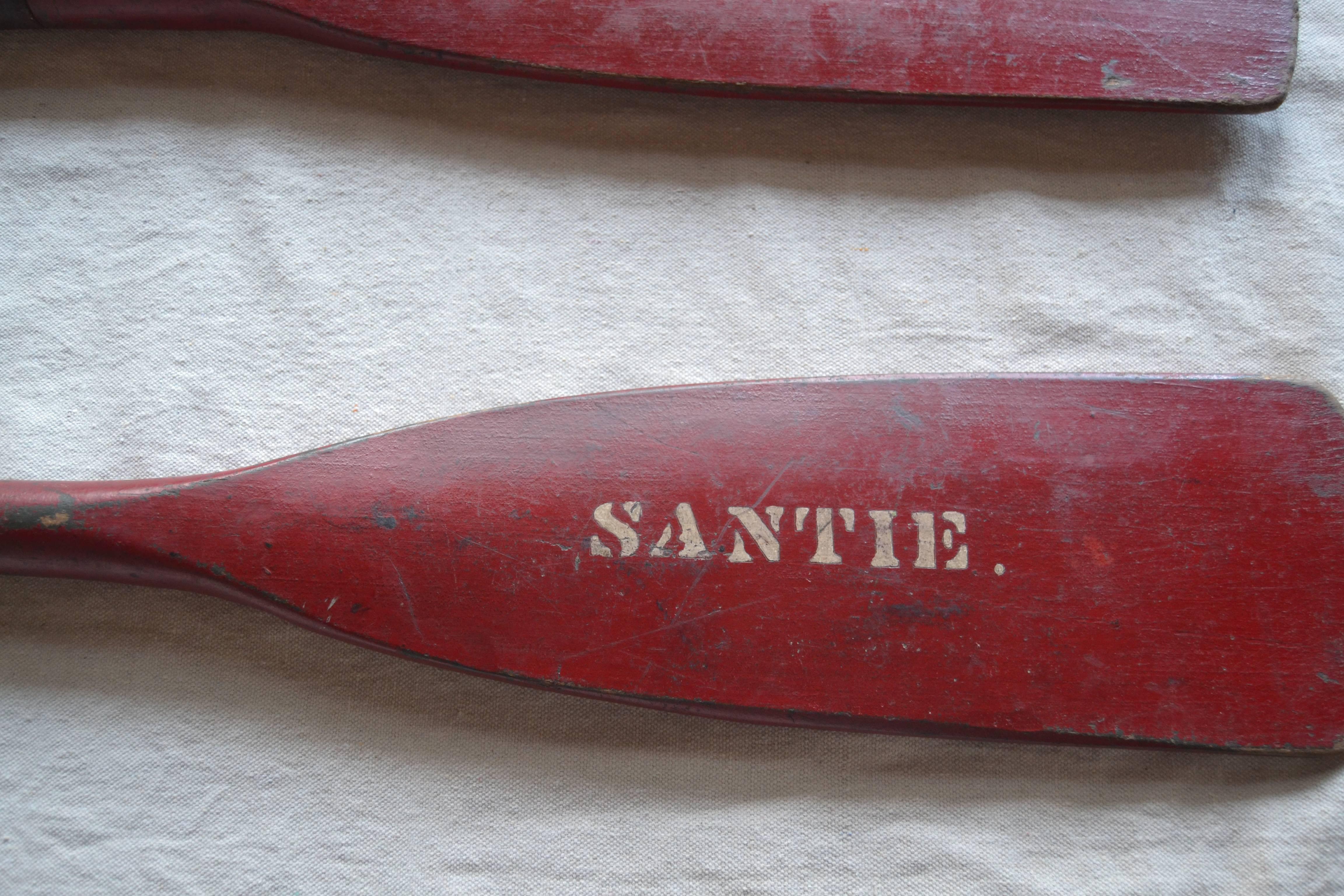 20th Century Painted Canoe Paddles with Iron Grips For Sale
