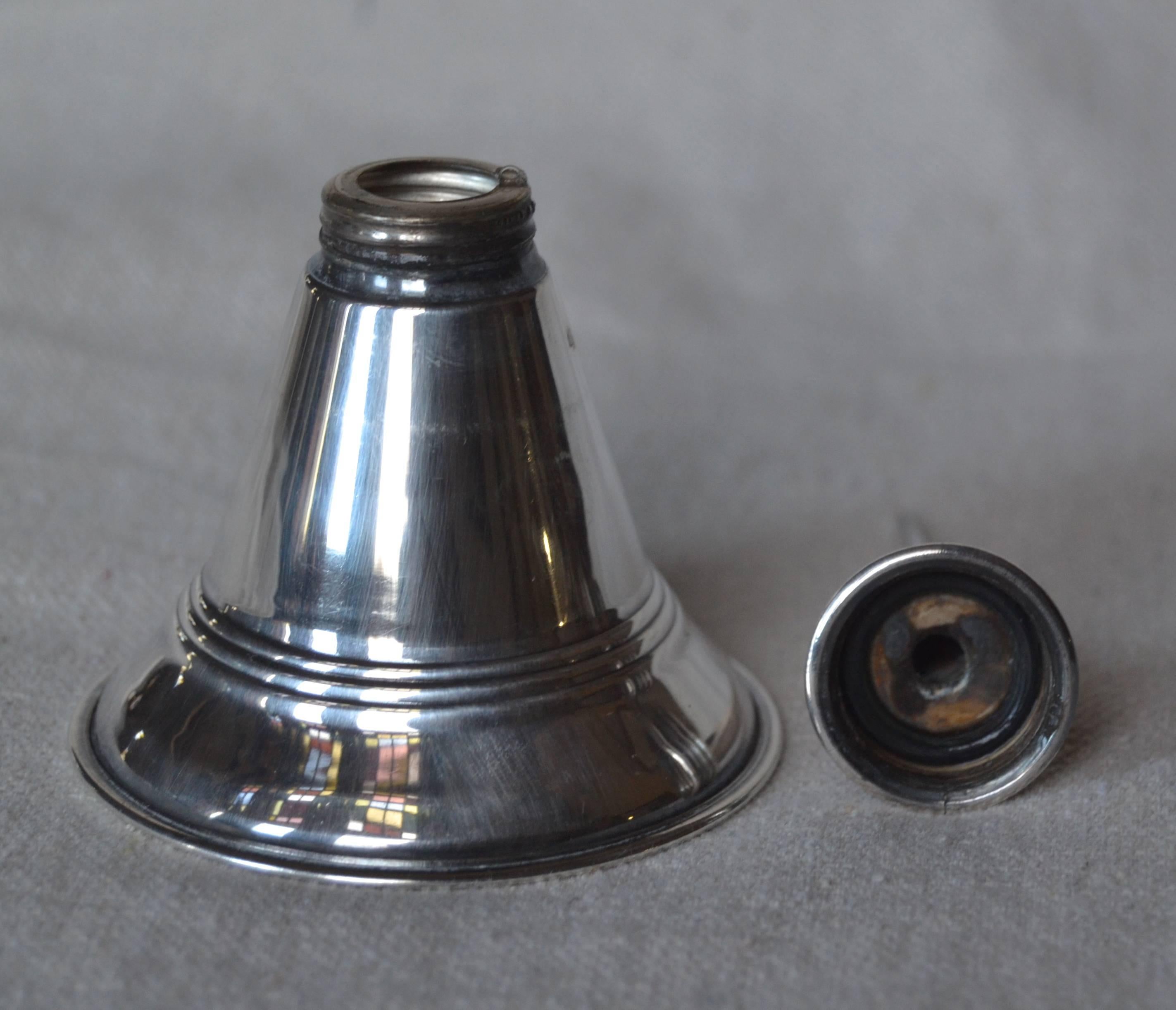 Whimsical Danish cocktail dropper in the whimsical form of an old fashioned oil can. Dispenses just a drop of vermouth for your very dry Martini. Stamped E. Dragsted, silver plate, Denmark, circa 1960s.
