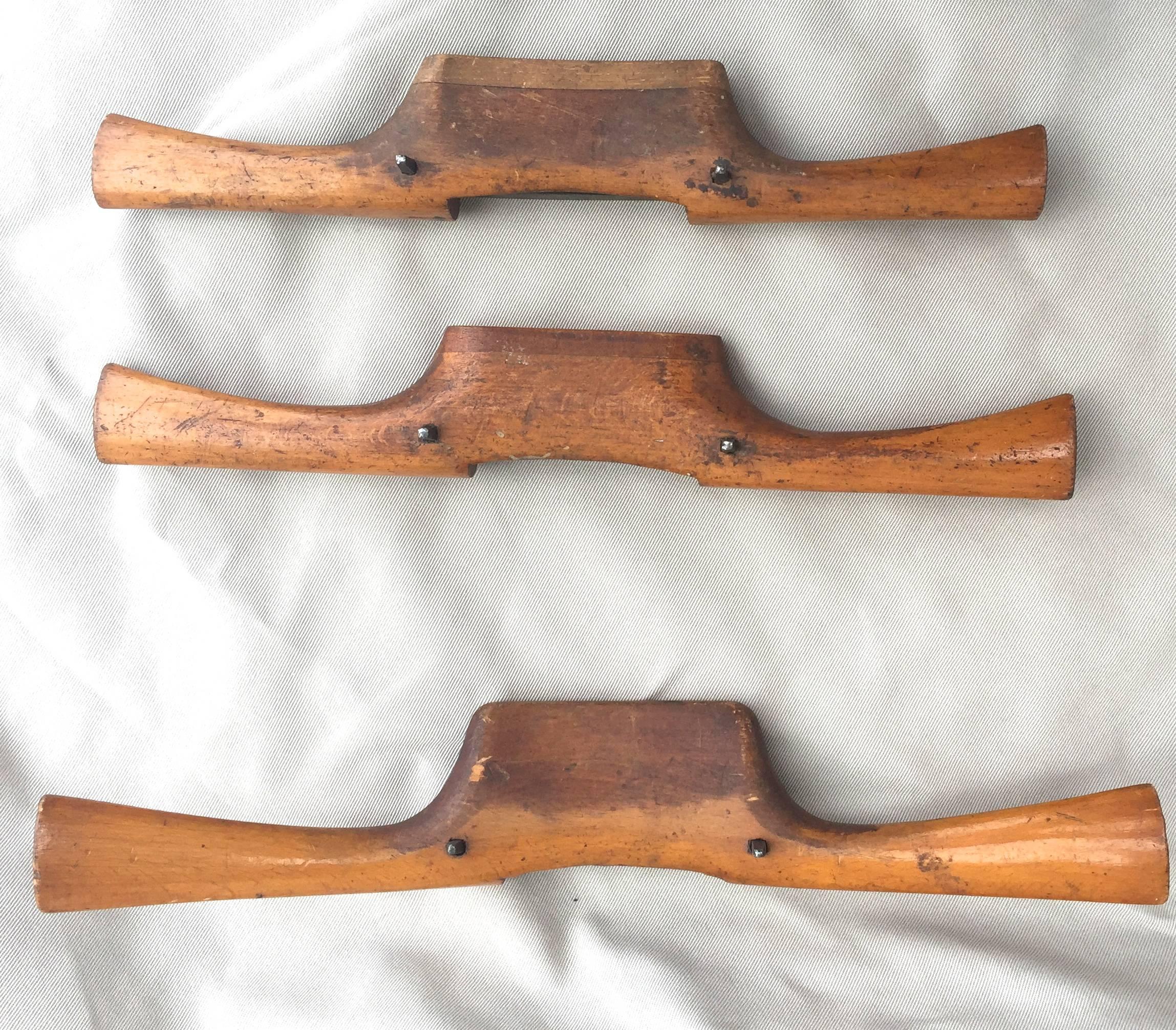 Three 19th century spokeshaves manufactured by Flather and Sons Sheffield England and retailed by Irving Row Warren St NYC. One has owner's initials carved into it. They are in sharpened usable condition.
A spokeshave is a tool used to shape and