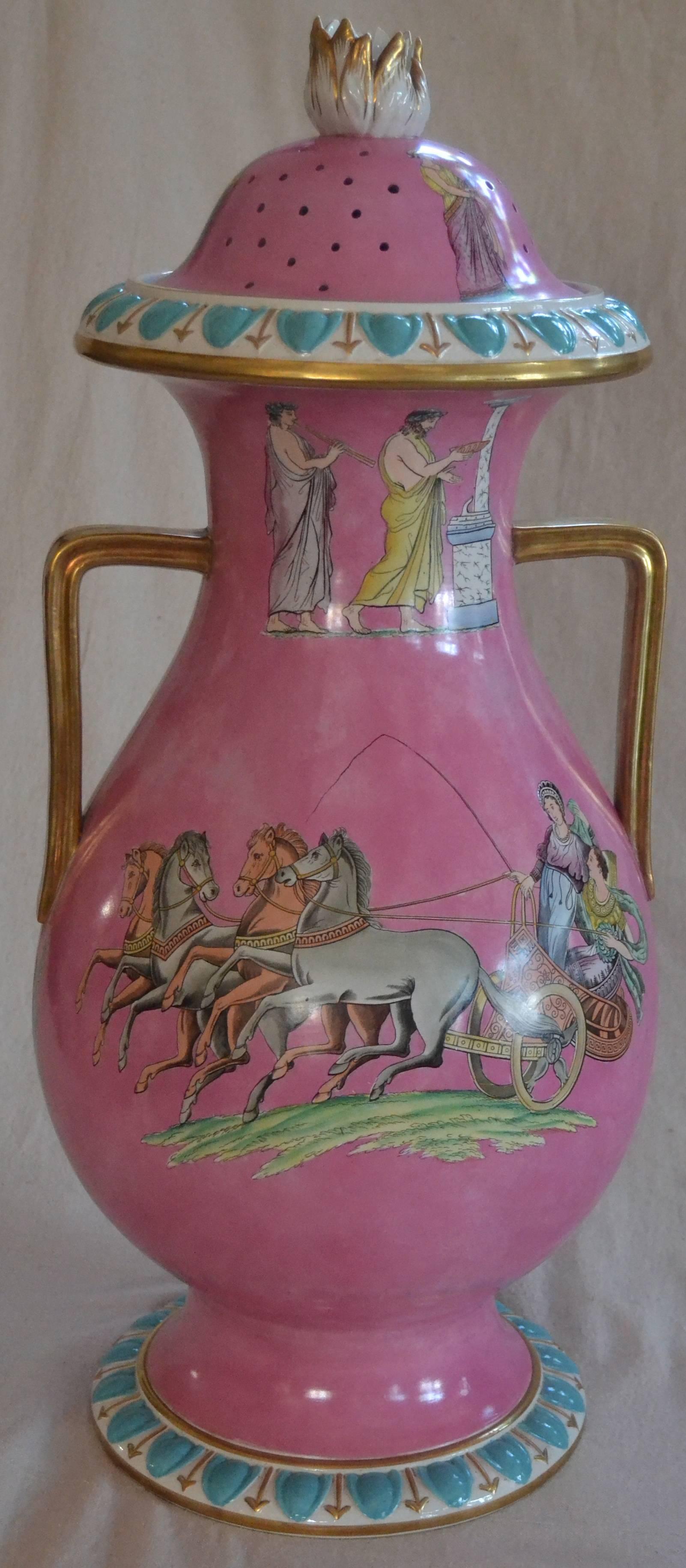 Monumental impressive ceramic leech jar with hand-colored transfer decoration and gilt handles.
Outstanding example of English ceramic art originally used for counter sales of medical leeches. Unusual pink ground with delicate coloration of the