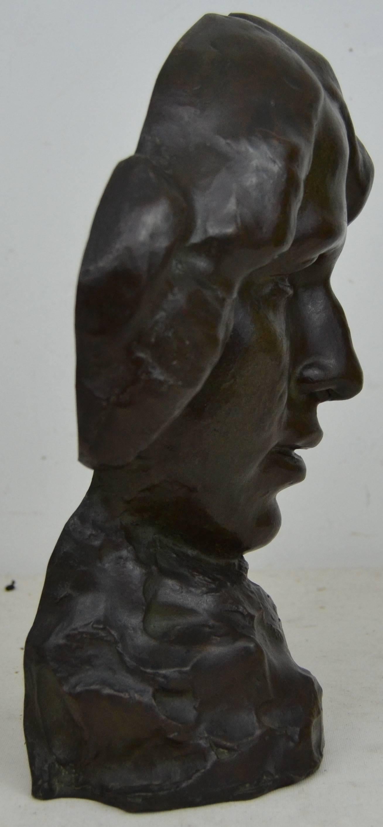 Bronze 3/4 relief bust of a women, dark brown patina with green highlights. Inscribed signature E. Jungblut Sahl, Weimar period.
