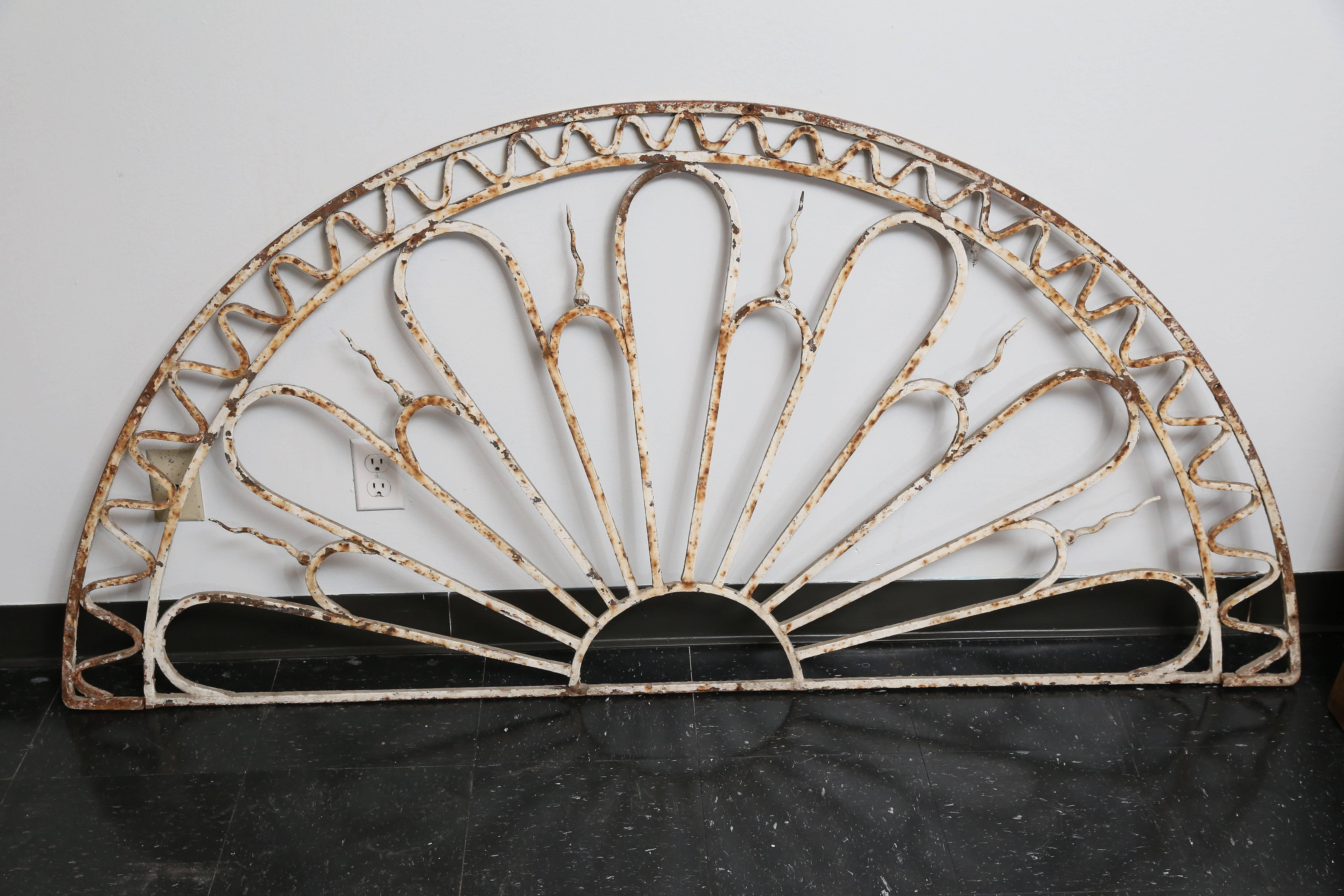 19th century Iron demilune shaped decor showing beautiful workmanship. Could be made into an iron console top or displayed on a wall.