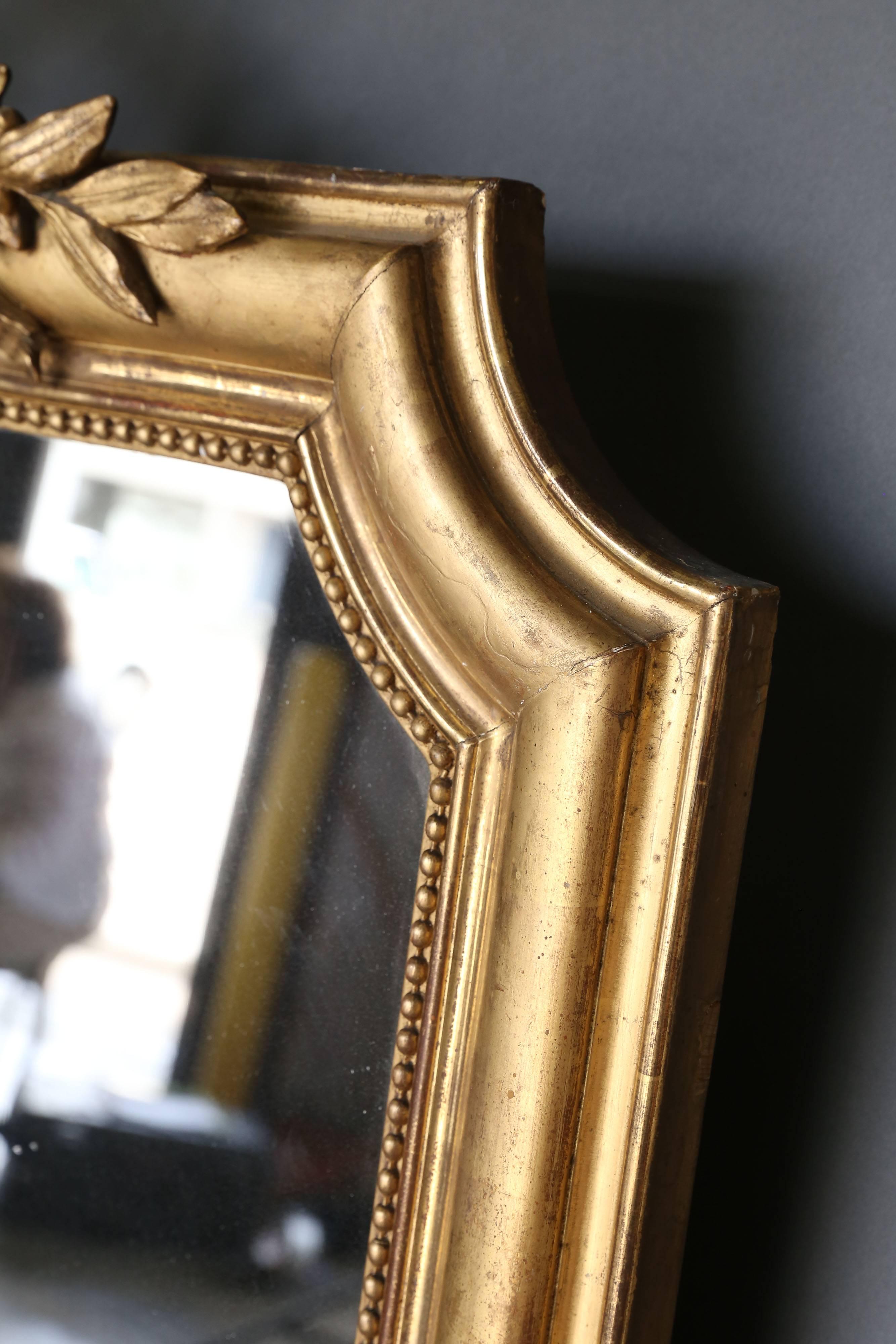 Large 19th Century Directoire Gilt Mirror with Crest In Excellent Condition In Houston, TX