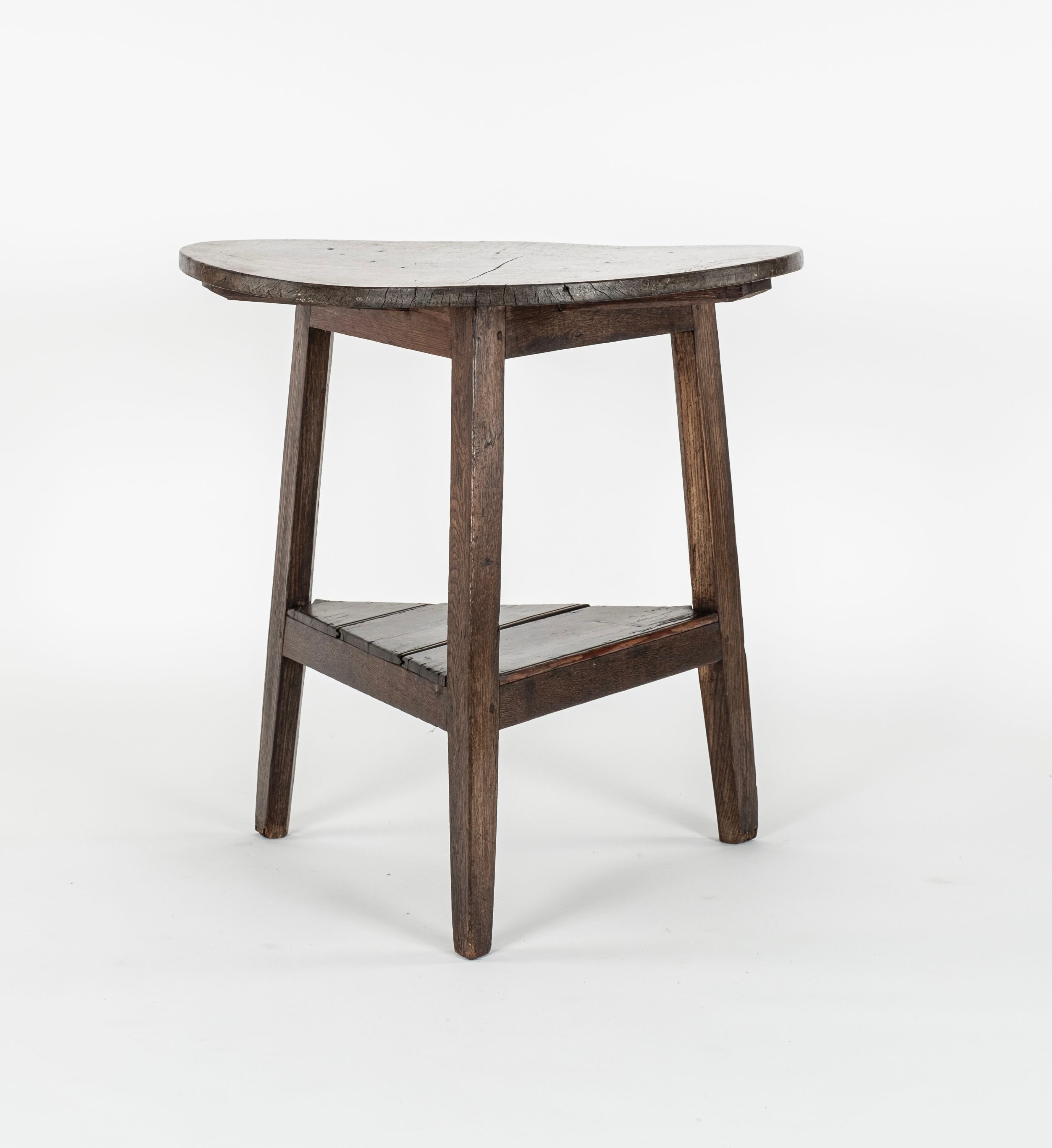 19th C. Cricket table made with 3 types of wood...Sycamore Single Piece Top; Alderwood legs; Pine under-tier.  Warpage to top.