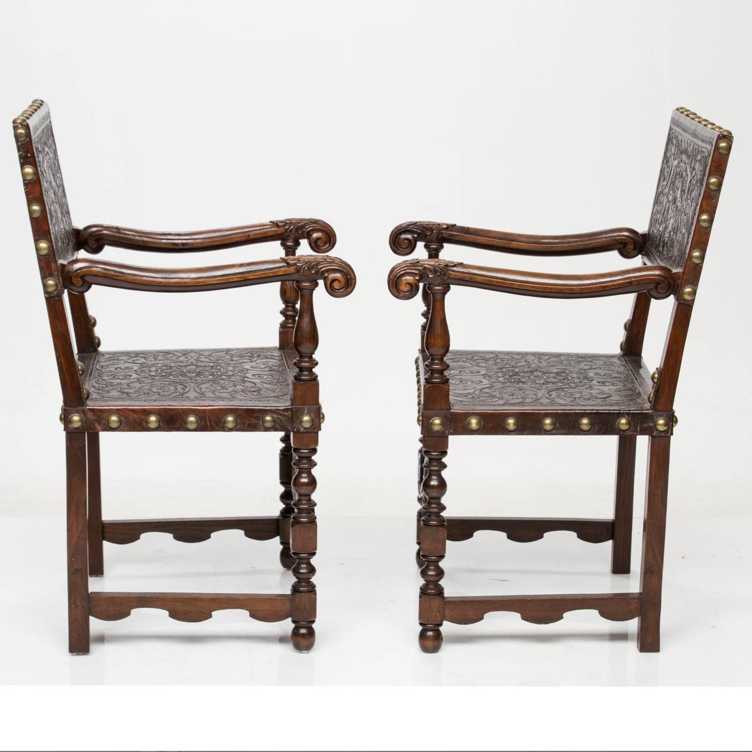 Vintage embossed leather armchairs
These chairs are made of walnut. Beautiful embossing to the leather seats and back. The leather is thick and in superb condition. Nice carved arms, turned front legs and arm supports. The two side stretcher are