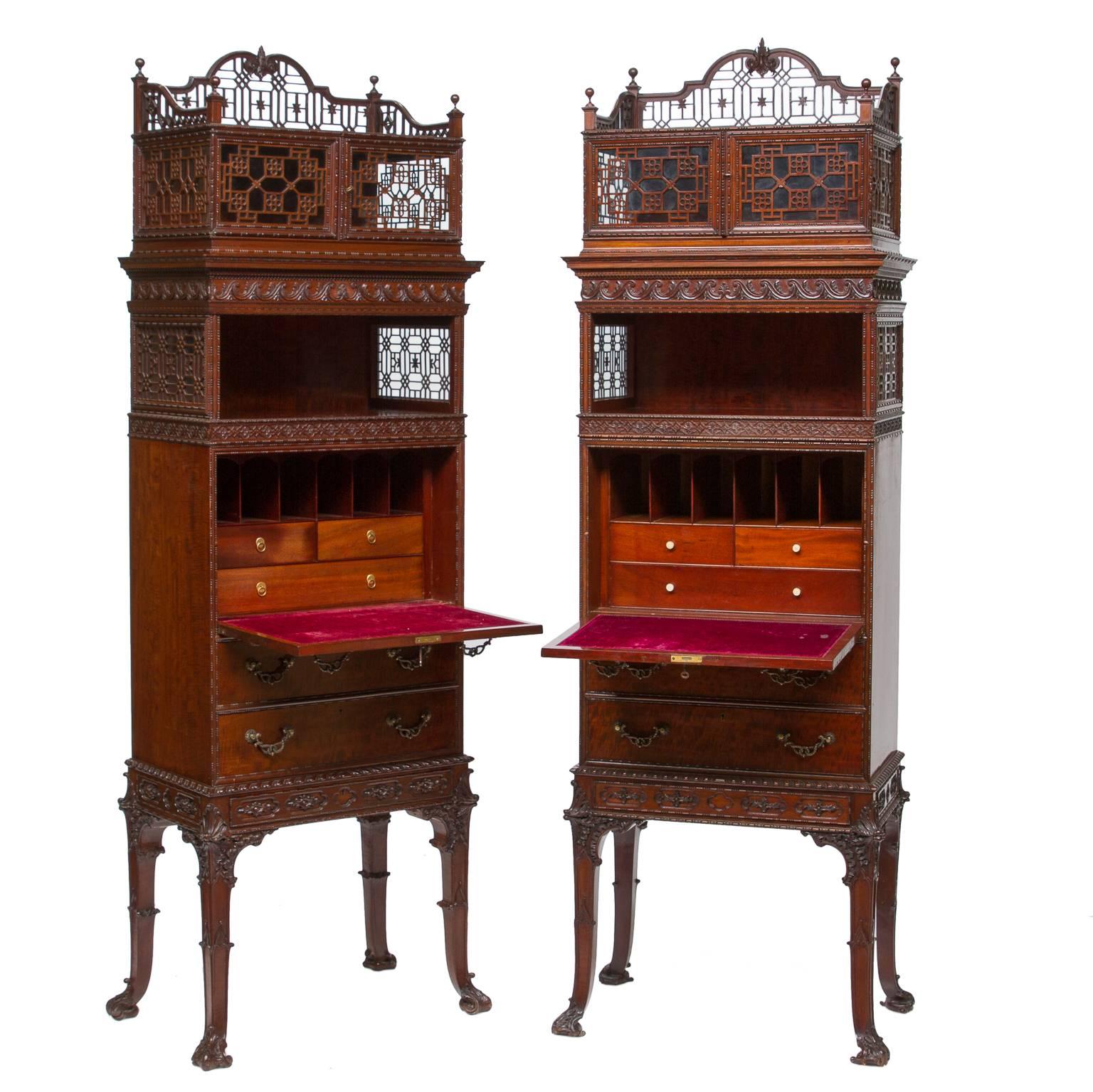 19th century Chippendale mahogany cabinets with secretary fronts

This is an amazing pair of cabinets. An example of fine craftsmanship is visible in these two cabinets. It is rare to find this type of quality. Quality is found in the selection of