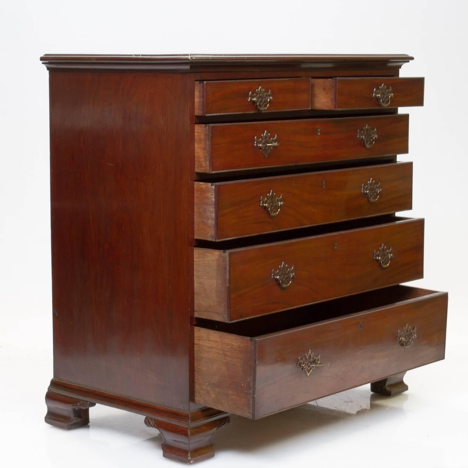 19th century Chippendale mahogany two over four chest of drawers on caved ogee bracket feet. Excellent choice of premier mahogany for the fronts of the drawers, notice the board sides and the beautiful grain and top section. Proper pierced batwing