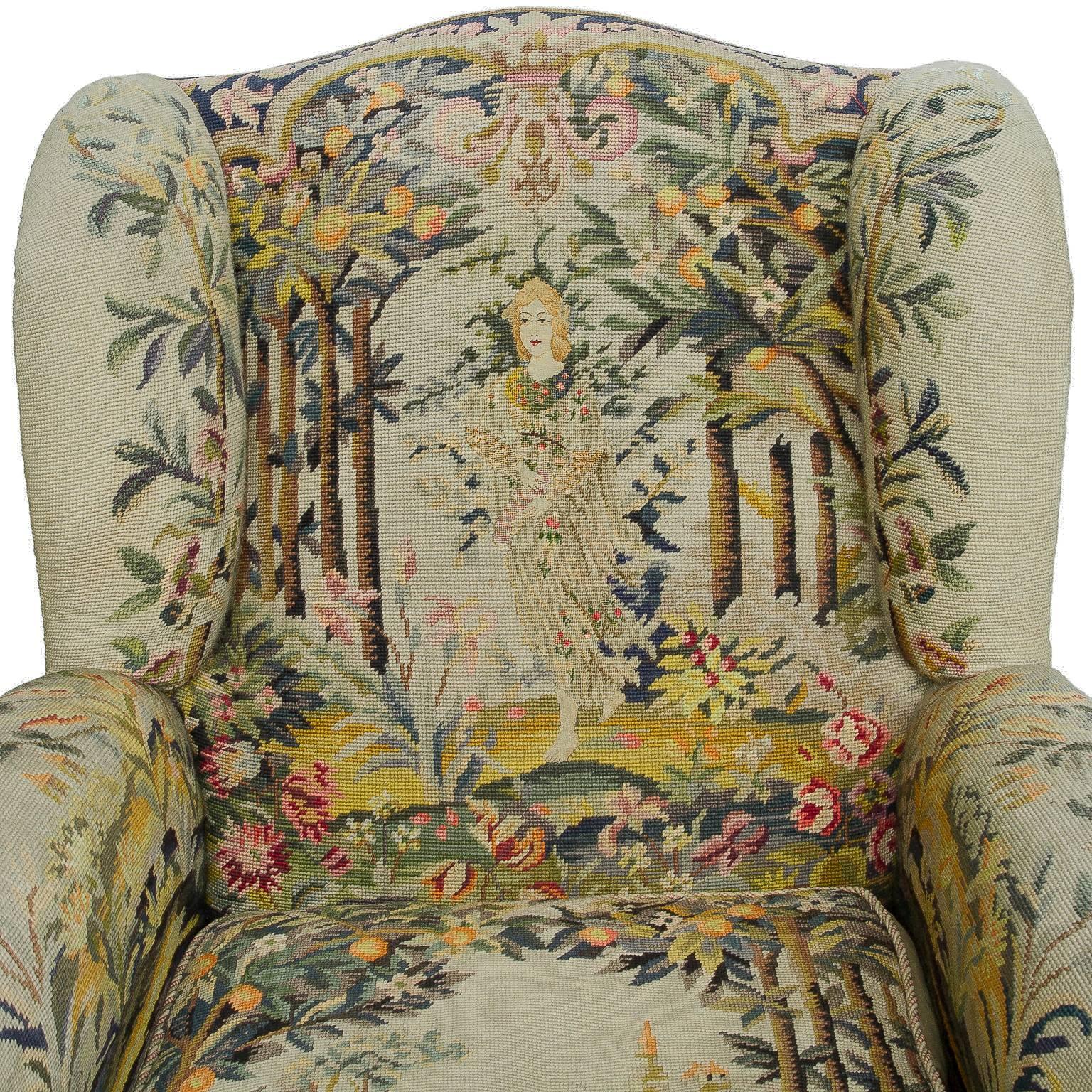 A unique and comfortable pair of of tapestry club chair style wing back chairs. These are made in the Chippendale style. The tapestry coverings are in excellent condition for the age. The tapestry however does not match but compliments each other.