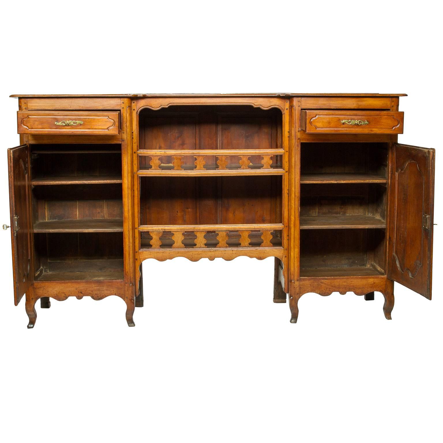 Antique steage Picardie made from quality french cherrywood and rubbed to a swanky glow. The style Provincial Louis XV. A seage picardie is a rare and useful piece of furniture. Looking at the piece you notice the break in the front. You have two