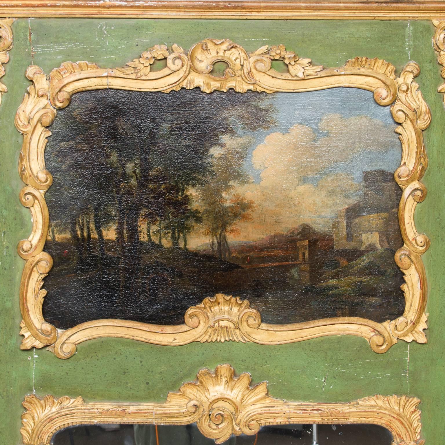 An early 19th century painted french trumeau mirror. Oil painting above the mirror. Wonderful gold leaf carvings and green color. Very high quality trumeau mirror, circa 1820-1830.

 Measures: 42″ wide,

 2.5″ deep,

 67″ tall.





