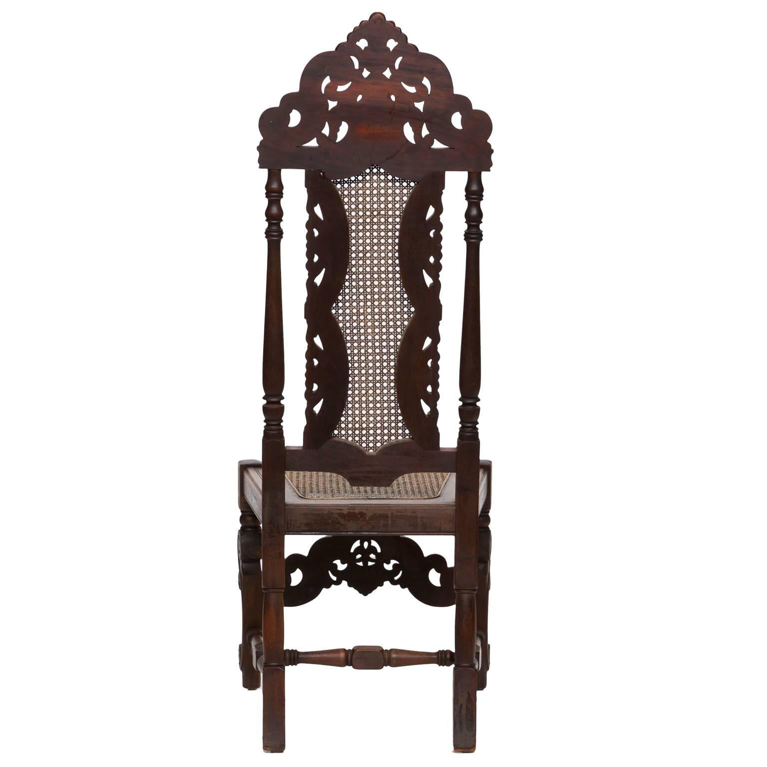 19th century carved walnut side chair with cane.