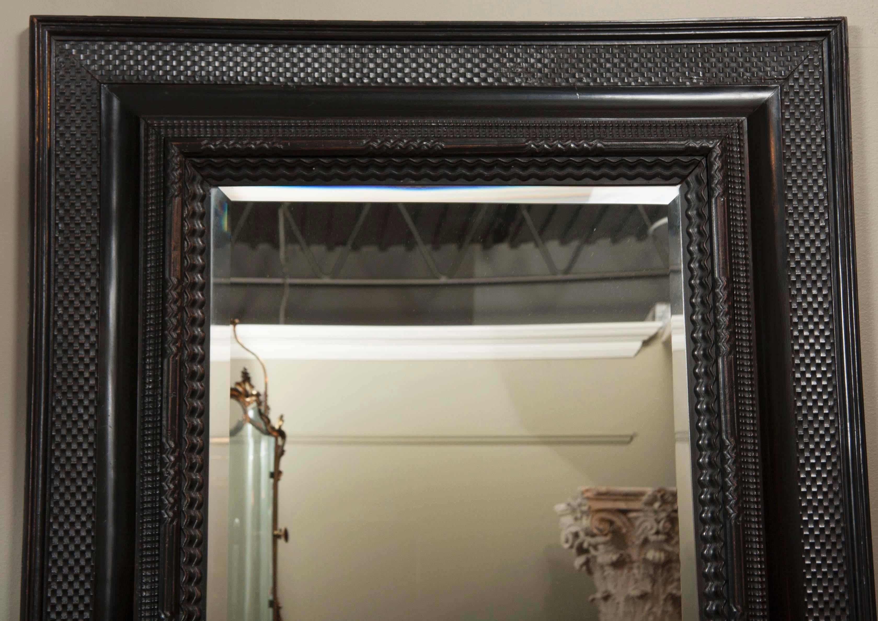 Northern Renaissance Large Late 19th Century Dutch Ripple Molded and Ebonized Mirror