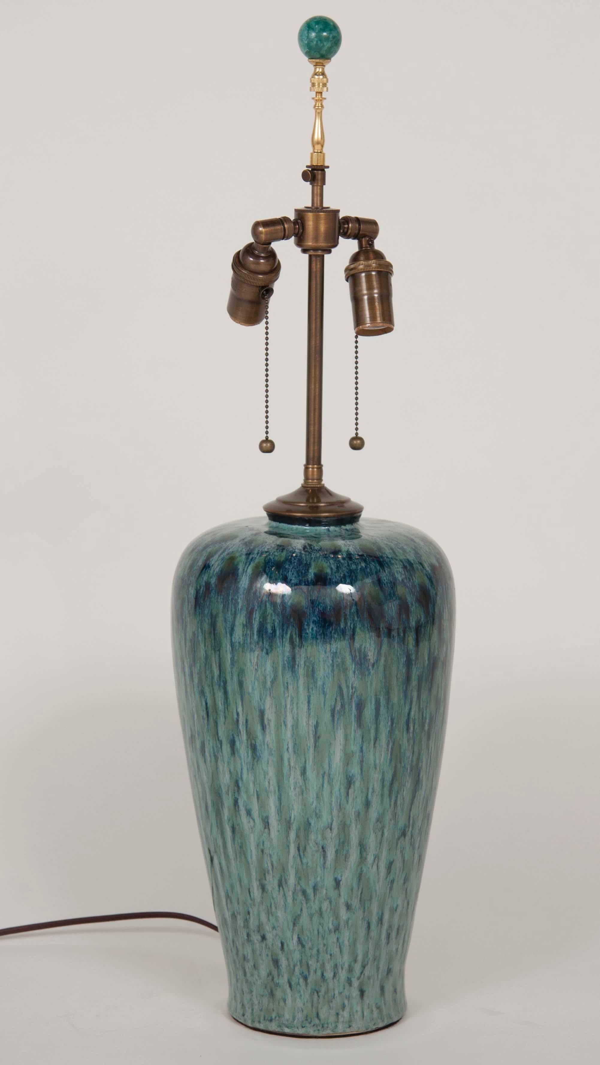 A beautifully glazed Chinese blue and green vase now as lamp.