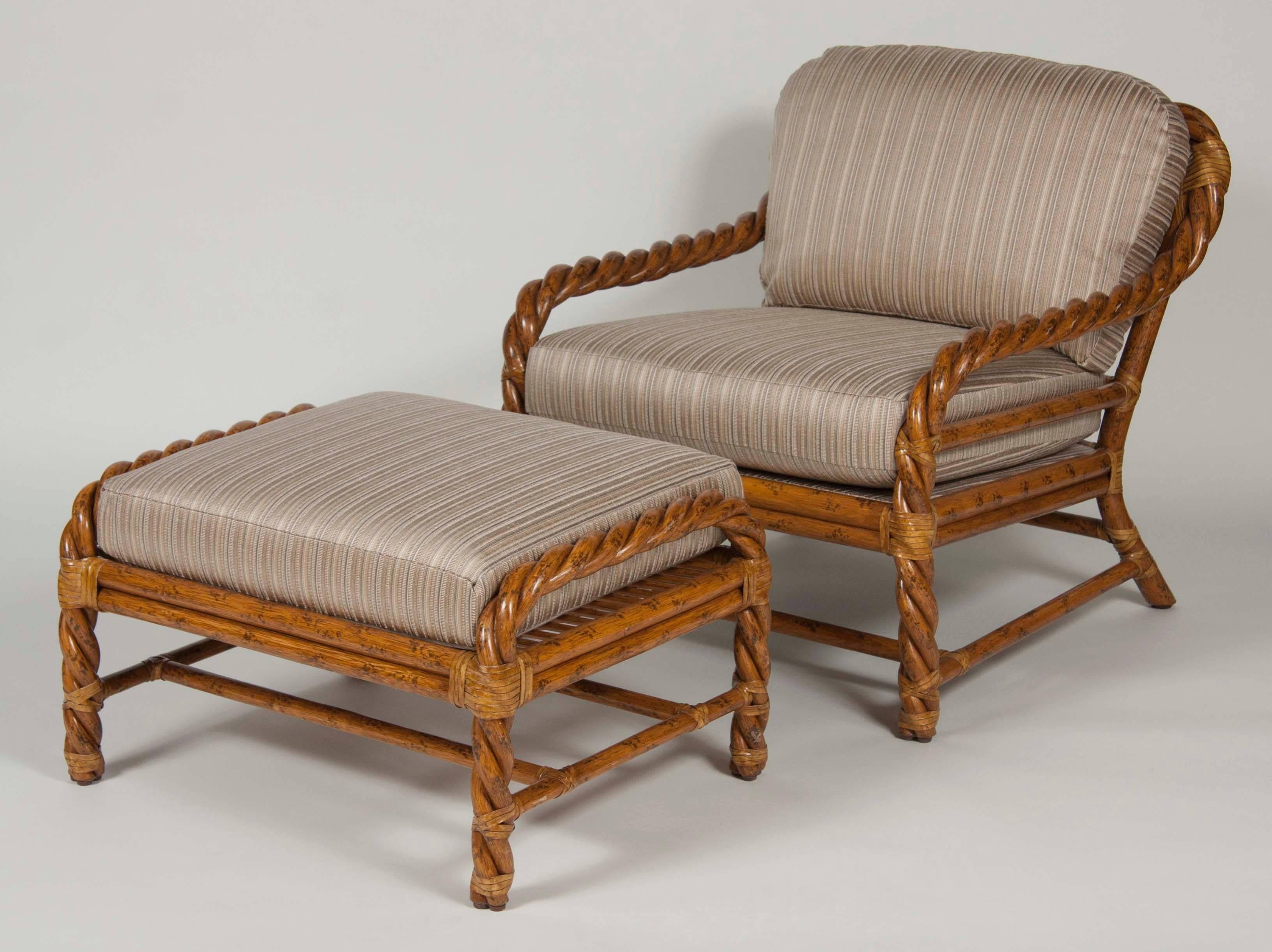 Top of the line pair of Mid-Century Modern rattan club chairs and ottoman by McGuire of twisted rattan and rawhide. Both club chairs and ottoman have been reupholstered.
Striking Mid-Century Modern intertwined bent rattan / cane and rawhide joint