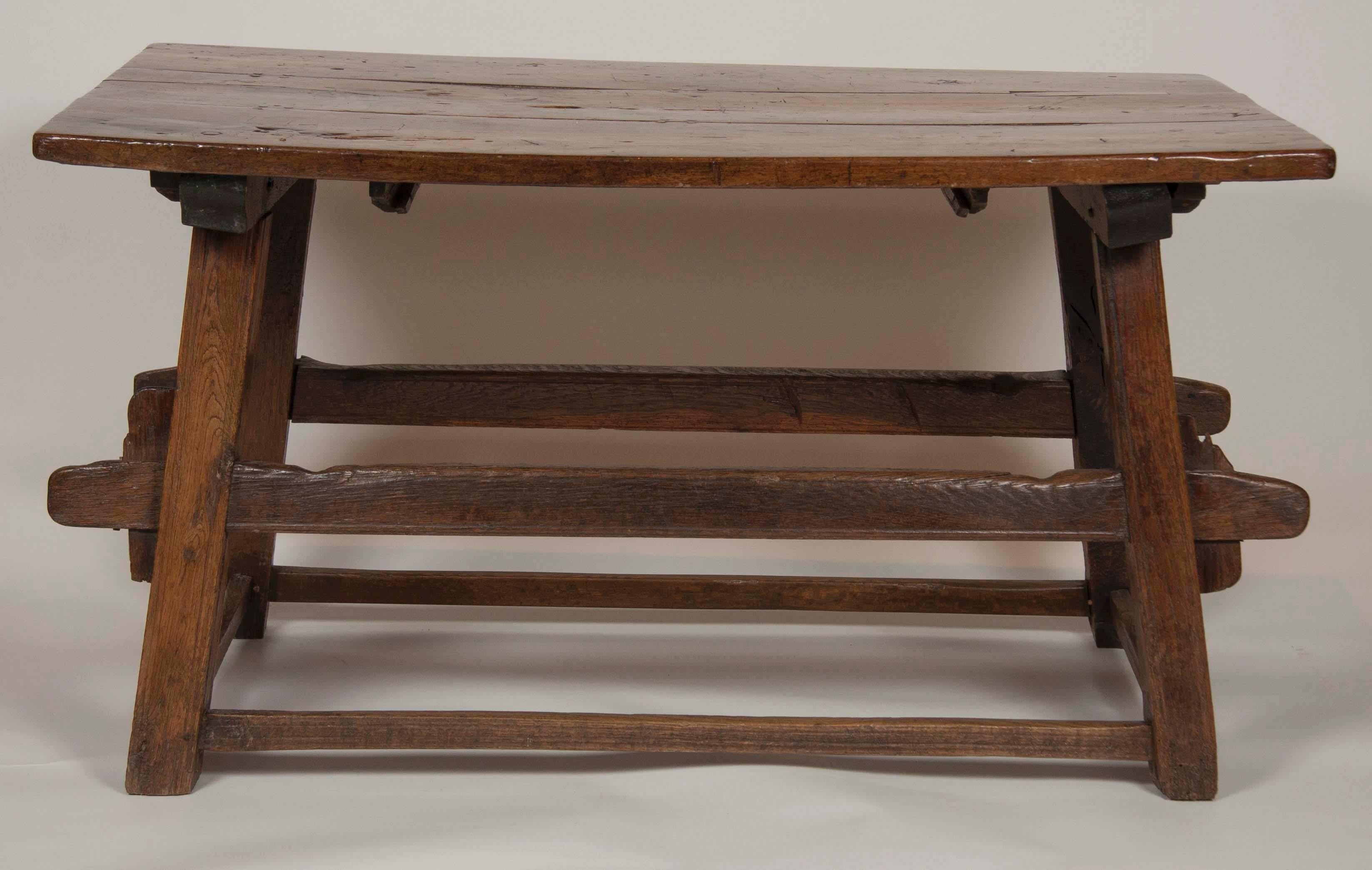 A handsome Continental oak trestle table.